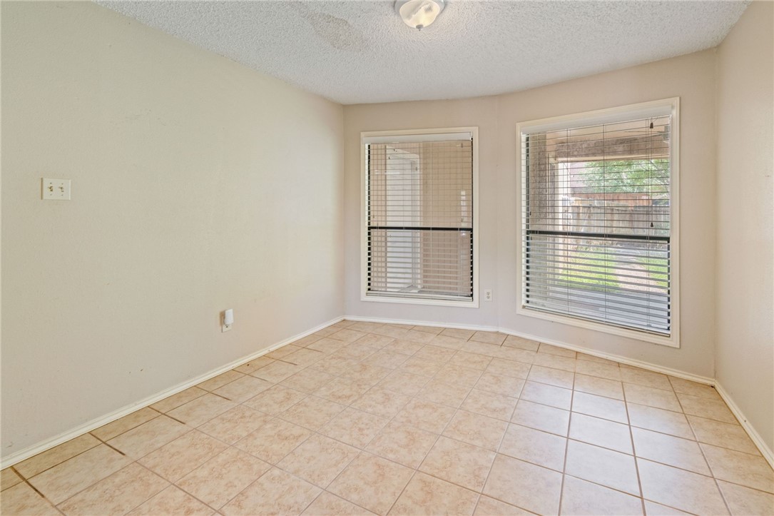 7209 Candy Ridge Road Corpus Christi, TX 78413 - Photo 6 of 24 a view of an empty room with a window
