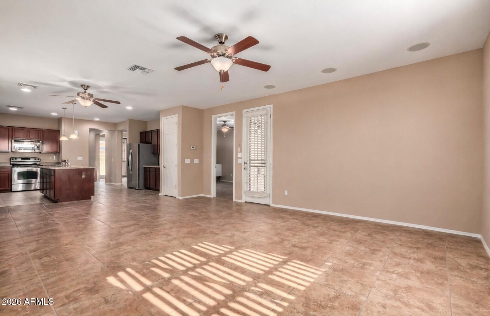 16093 West Almeria Road Goodyear, AZ 85395 - Photo 9 of 38 Family room