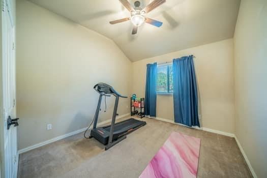 166 Oxford Ranch Road Waxahachie, TX 75167 - Photo 15 of 27 Vaulted ceiling with a ceiling fan, carpeted flooring, and a single window with blinds