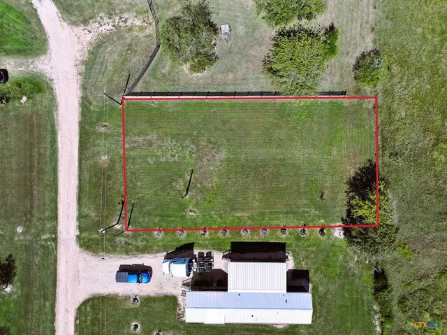 a view of a lush green field