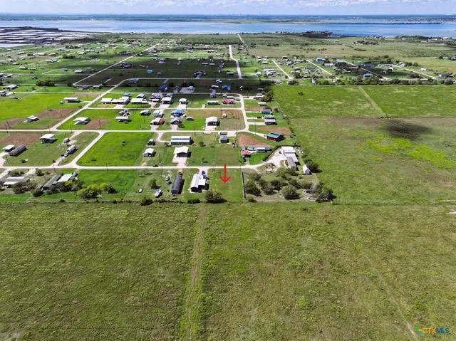 a view of a water heater and a floor to ceiling window