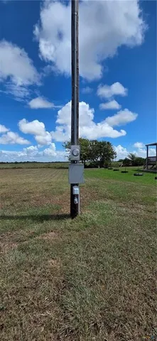 a view of a golf course with a lake