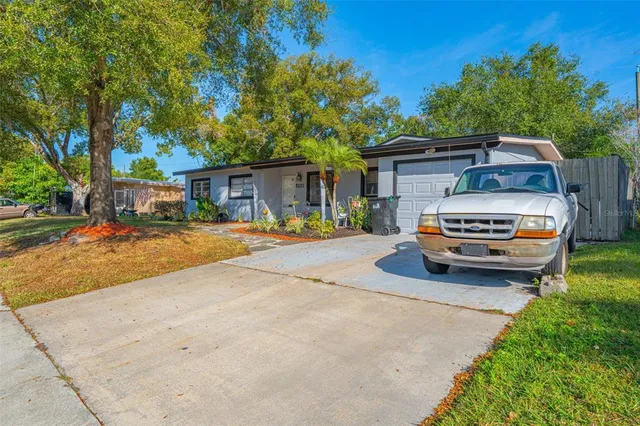 a car parked in front of a house