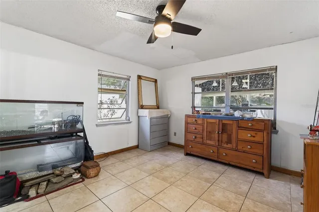a room with a cabinet and a mirror