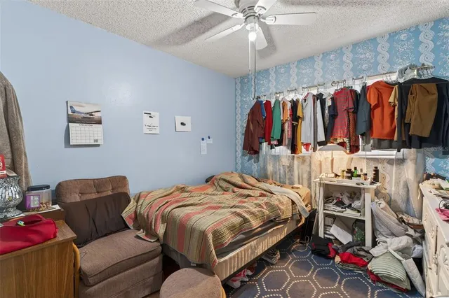 a bed room with a bed and a walk in closet