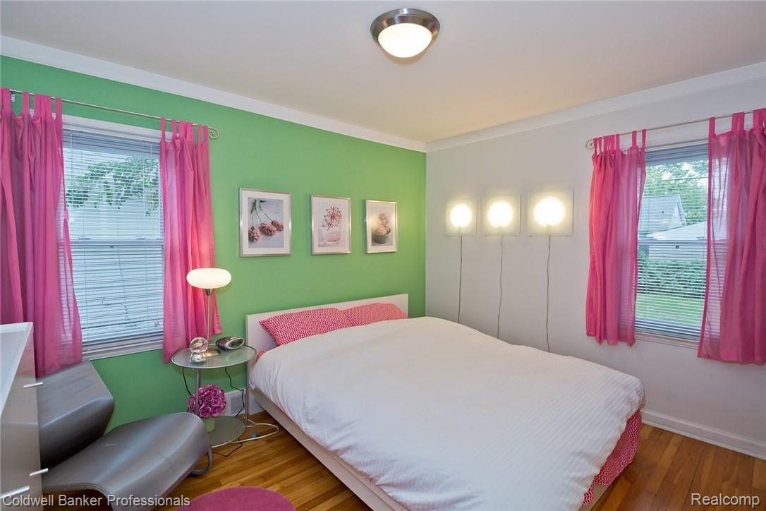 1059 Harvard Road Berkley, MI 48072 - Photo 8 of 20 Additional 1st floor bedroom features hardwood floors, central lighting, and great natural light.