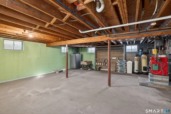 a view of a room with wooden ceiling