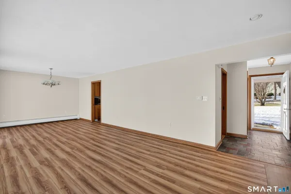 a view of an empty room and window