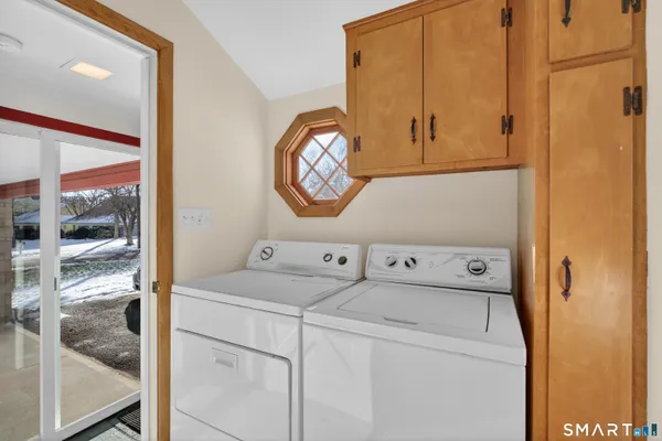 a utility room with dryer and washer