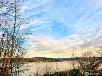 a view of lake and mountain