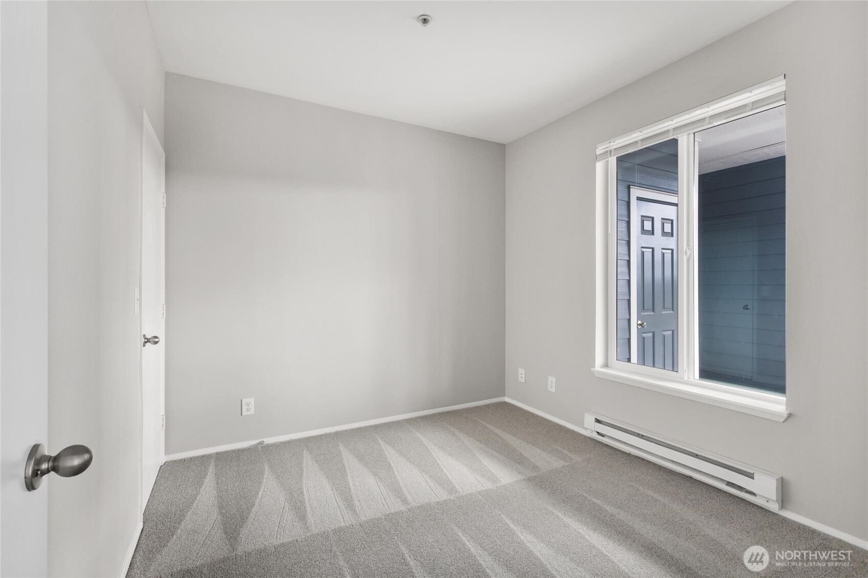 3926 243rd Place Southeast, Unit H201 Bothell, WA 98021 - Photo 15 of 31 a view of an empty room with a window