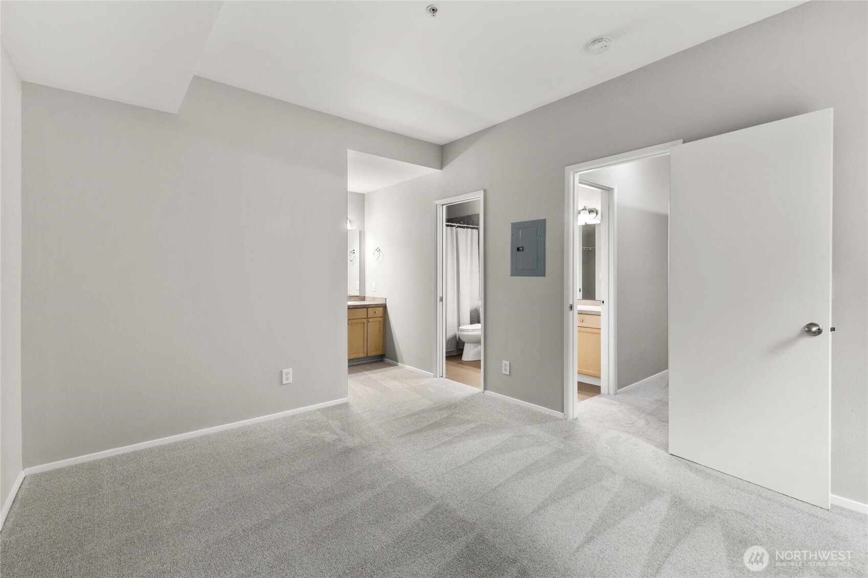 3926 243rd Place Southeast, Unit H201 Bothell, WA 98021 - Photo 17 of 31 a view of an empty room with a cabinet