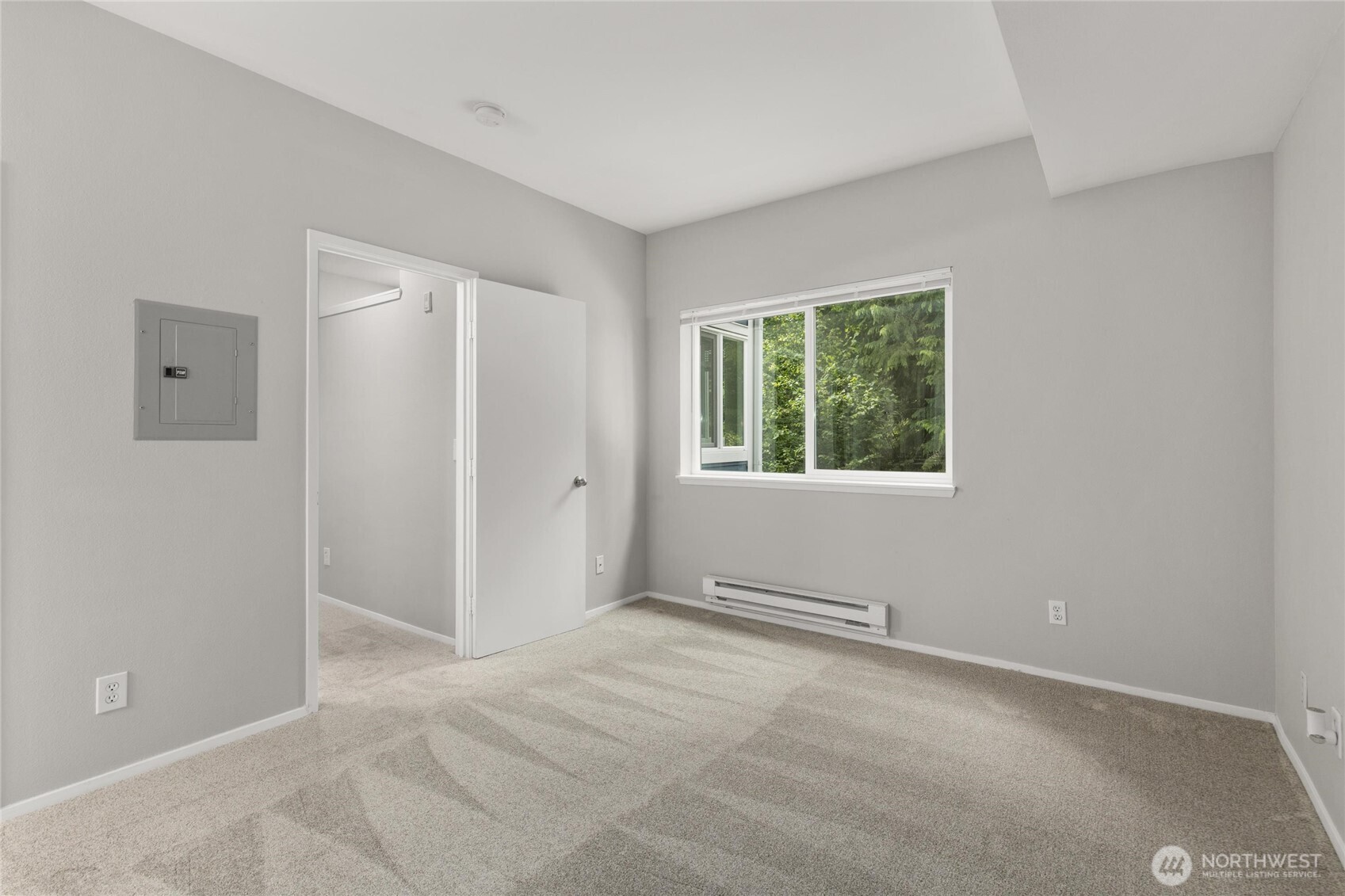 3926 243rd Place Southeast, Unit H201 Bothell, WA 98021 - Photo 18 of 31 an empty room with windows