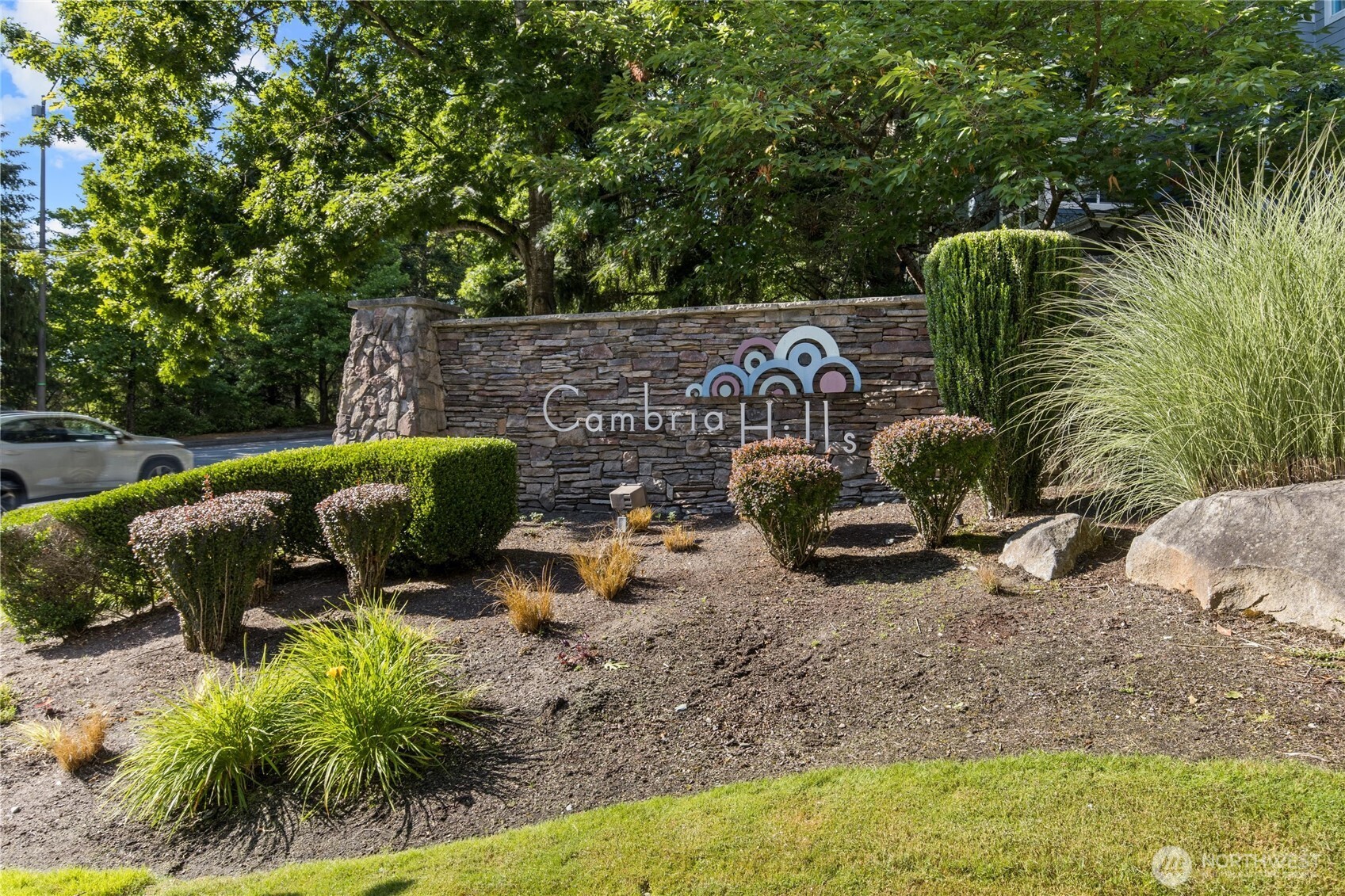 3926 243rd Place Southeast, Unit H201 Bothell, WA 98021 - Photo 28 of 31 a view of a backyard with sitting area and furniture