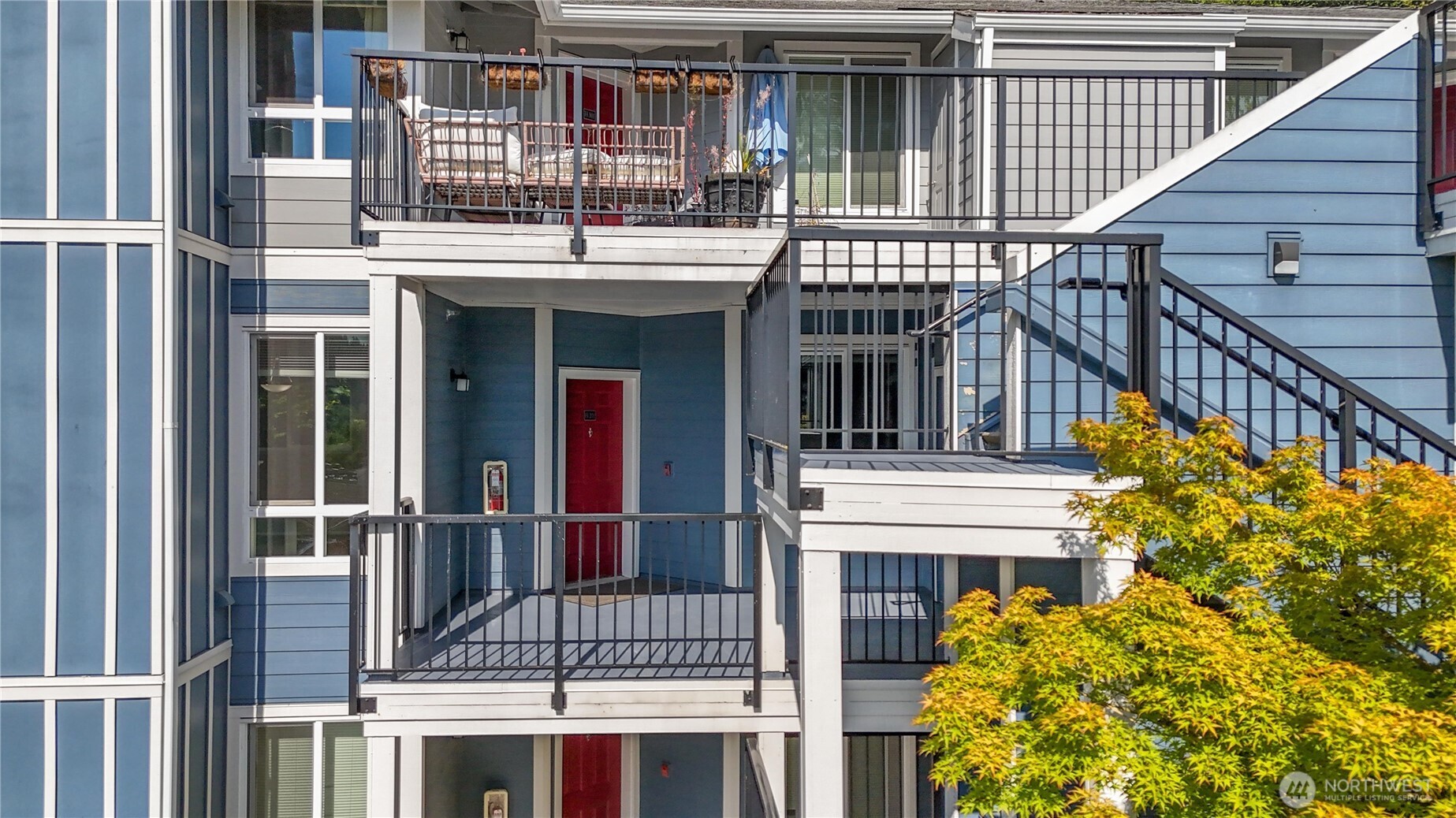 3926 243rd Place Southeast, Unit H201 Bothell, WA 98021 - Photo 30 of 31 a view of a house with iron stairs