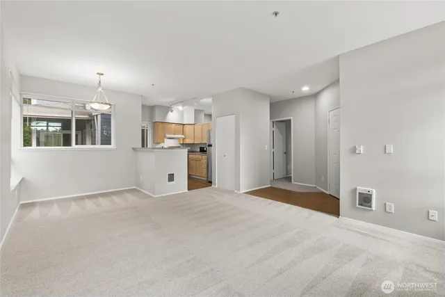 a bedroom with a bed and a fireplace