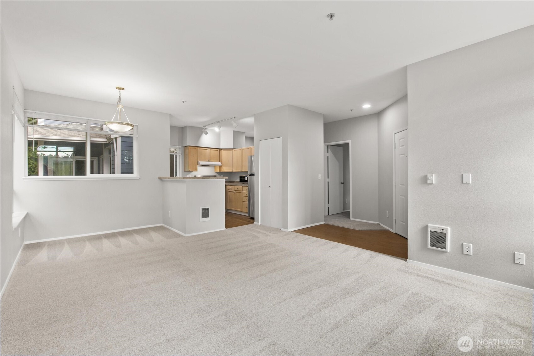 3926 243rd Place Southeast, Unit H201 Bothell, WA 98021 - Photo 3 of 31 a view of a kitchen with a sink