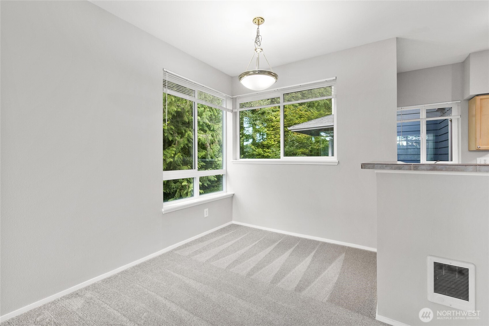 3926 243rd Place Southeast, Unit H201 Bothell, WA 98021 - Photo 6 of 31 a view of an empty room with a window