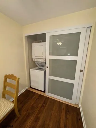 a view of kitchen and wooden floor