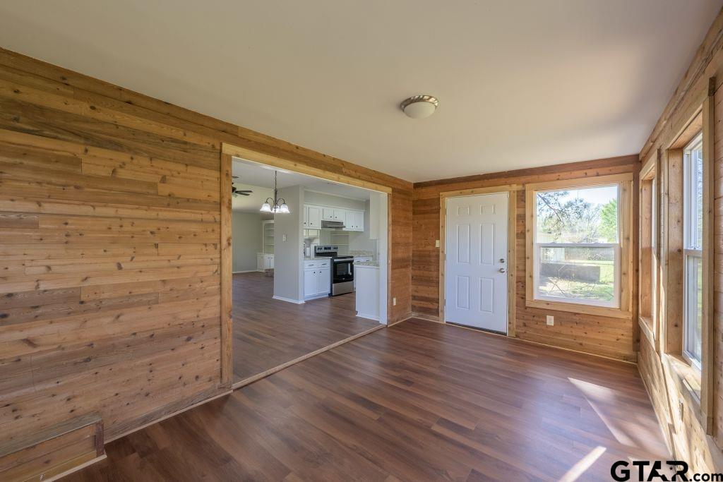 14212 Arber Street Flint, TX 75762 - Photo 20 of 38 wooden floor in an empty room with a window