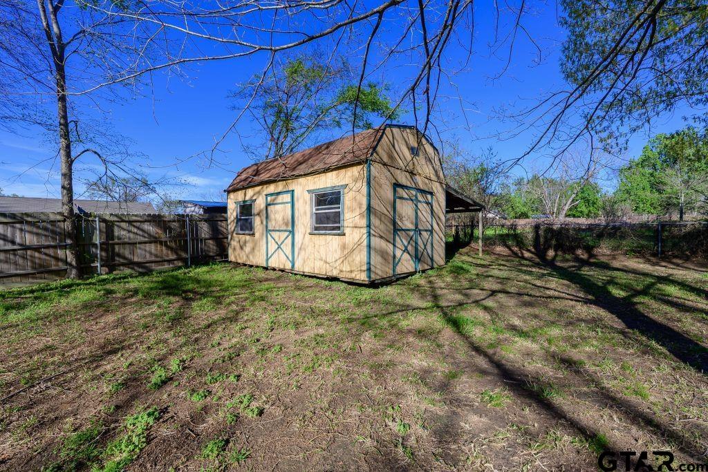 14212 Arber Street Flint, TX 75762 - Photo 32 of 38 a view of a house with a yard