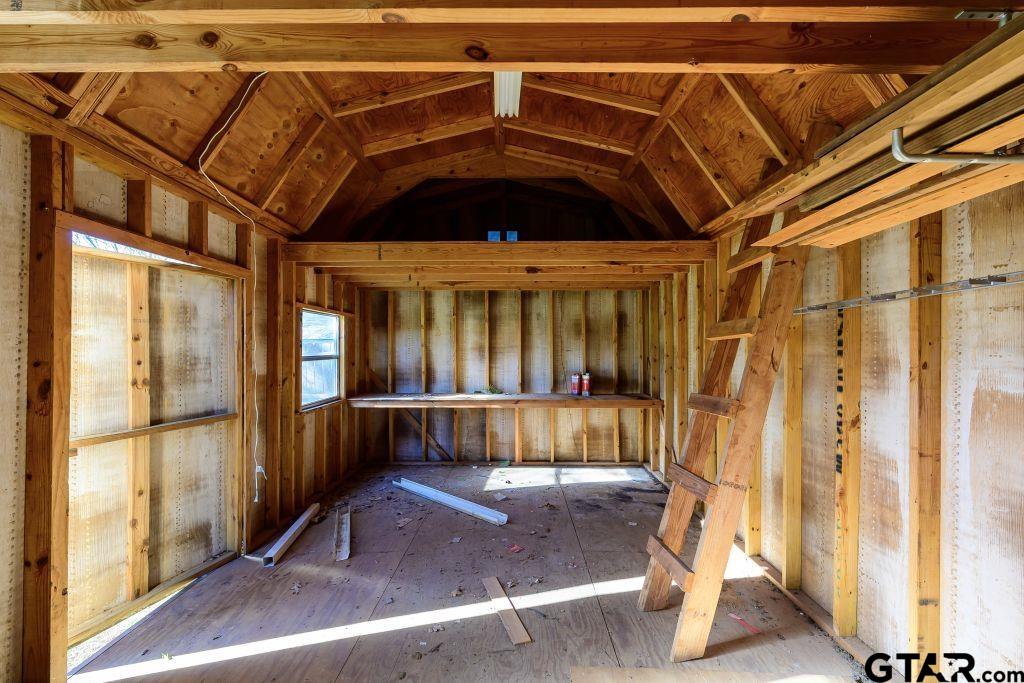 14212 Arber Street Flint, TX 75762 - Photo 35 of 38 a view of a patio with table and chairs