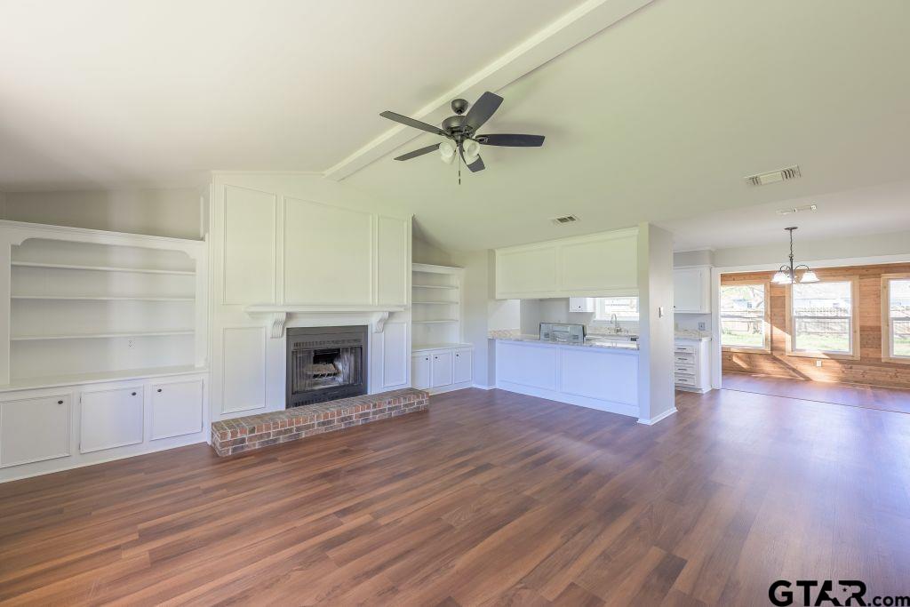 14212 Arber Street Flint, TX 75762 - Photo 7 of 38 a view of a room window and wooden floor