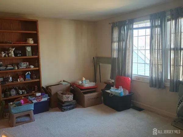 a room with furniture and a window