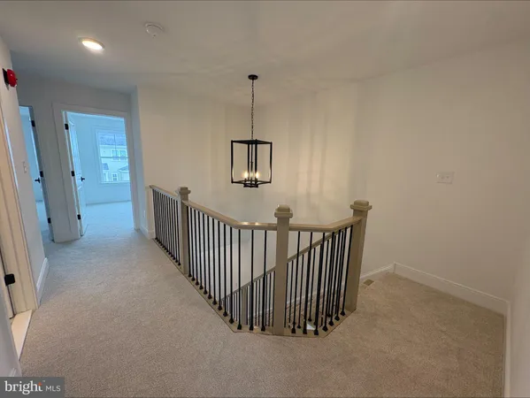 a view of a hallway with entryway