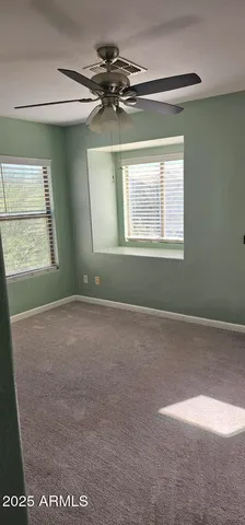 a view of a room that has a window in it