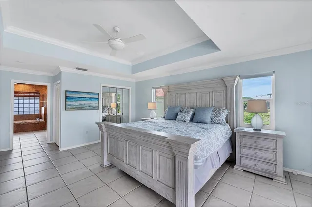 a bedroom with a bed and a cabinets