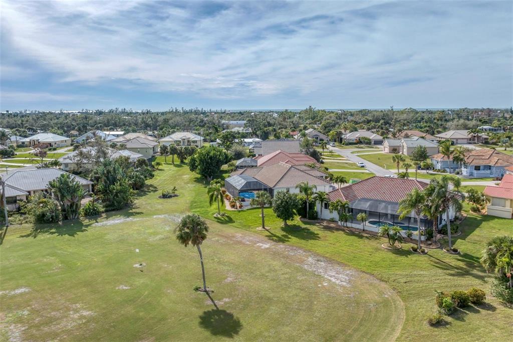 11 Amberjack Terrace Placida, FL 33946 - Photo 35 of 38 a view of a lake with a yard