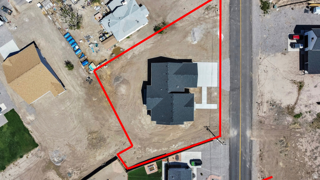 840 South Jones Road Monroe, UT 84754 - Photo 42 of 52 Lines are approximate. Newly constructed residence with a dark shingle roof and a concrete driveway