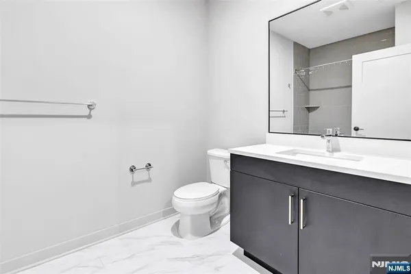 a bathroom with a sink and a toilet