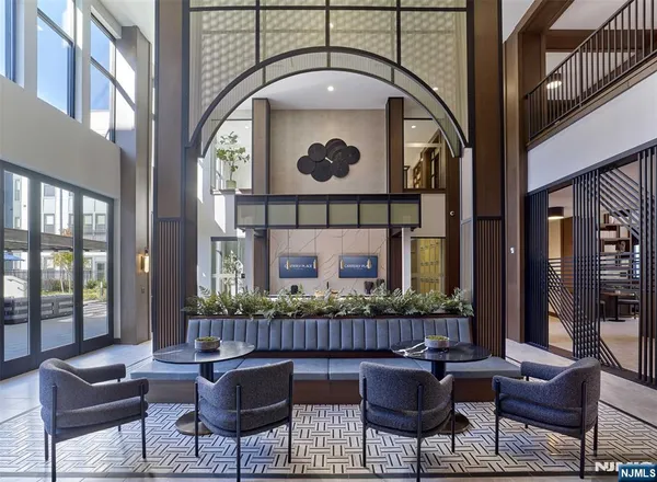 a view of a balcony with furniture