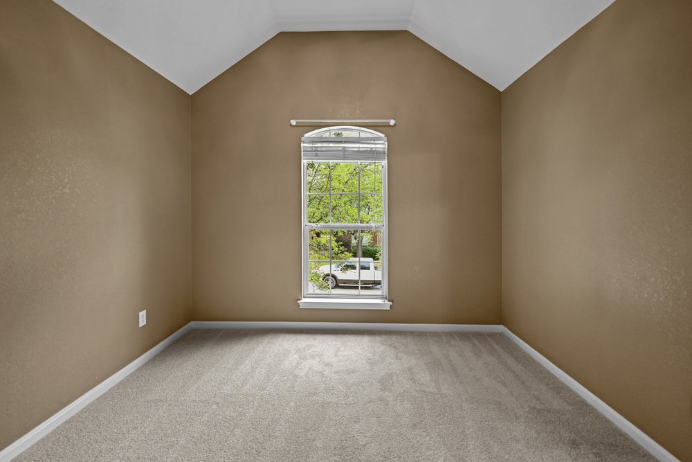 2823 Lantana Ridge Drive Austin, TX 78732 - Photo 26 of 34 an empty room with windows