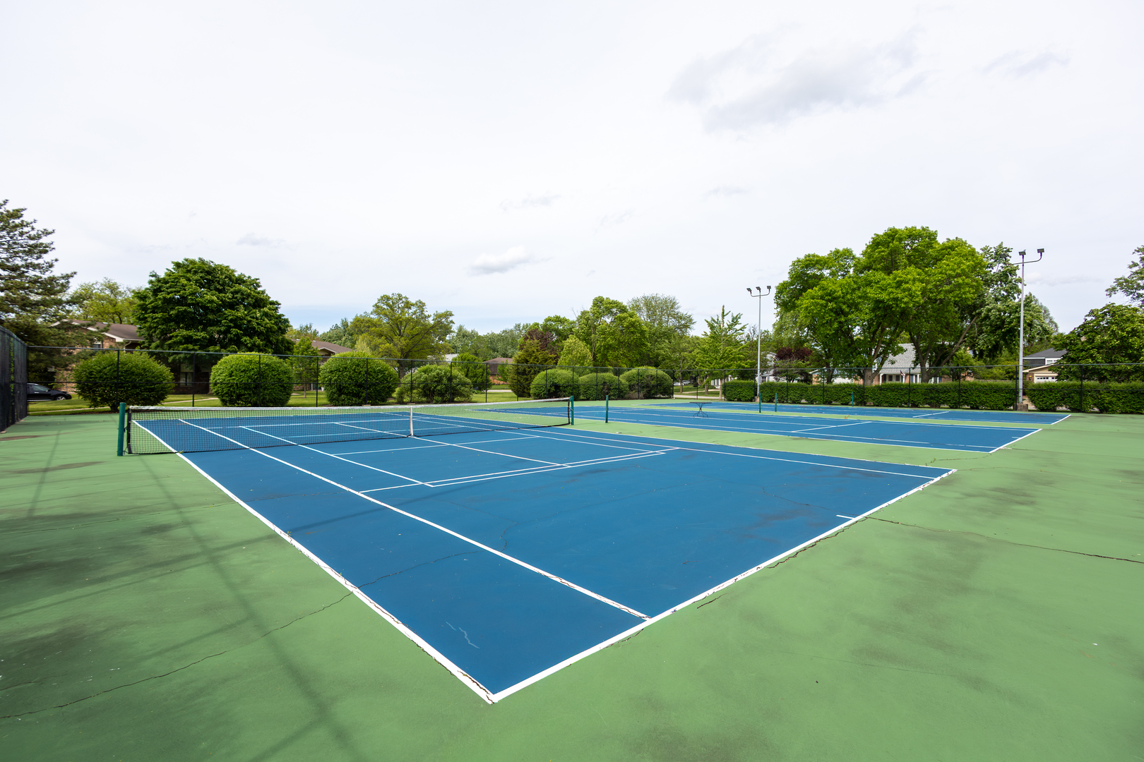 450 Raintree Court, Unit 2B Glen Ellyn, IL 60137 - Photo 26 of 28 a view of a tennis court