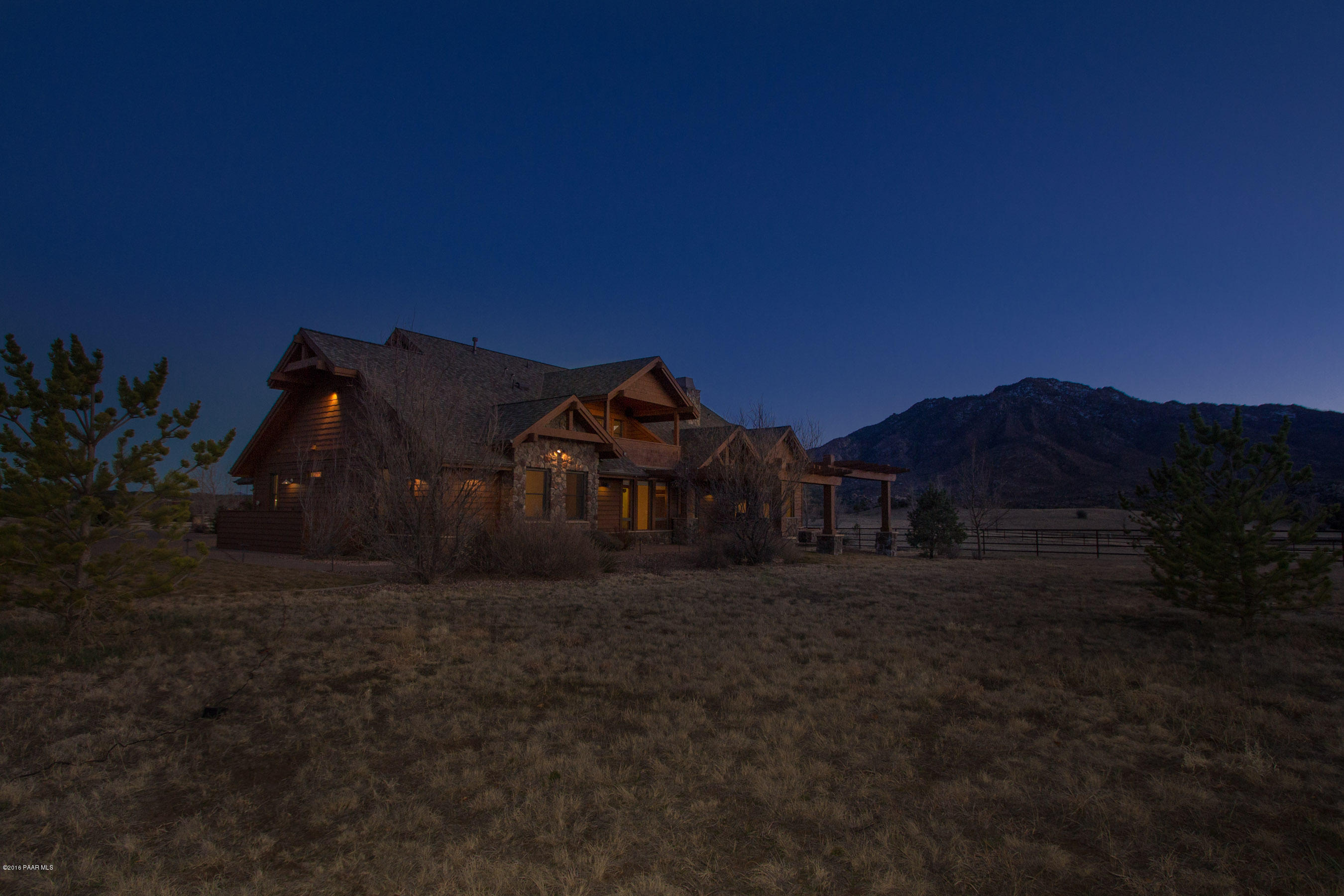 9160 North American Ranch Road Prescott, AZ 86305 - Photo 36 of 59 036_Back Of Home Twilight