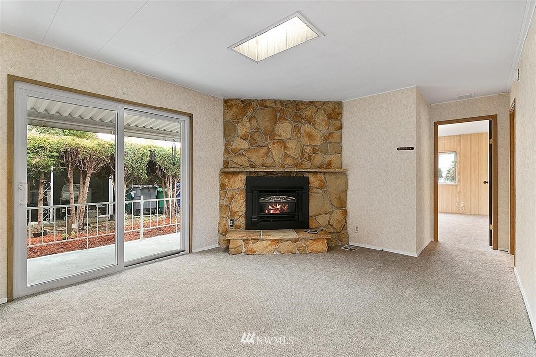 201 Union Avenue Southeast, Unit 135 Renton, WA 98059 - Photo 13 of 33 a view of a chandelier and window in a room