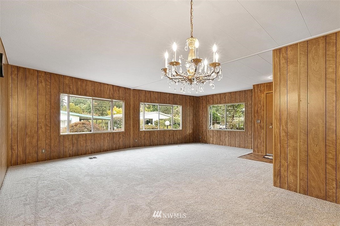 201 Union Avenue Southeast, Unit 135 Renton, WA 98059 - Photo 7 of 33 a view of a chandelier and window in a room