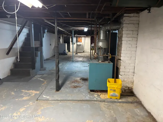 a view of storage and utility room