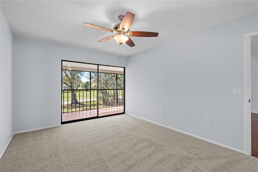 6110 Country Club Way, Unit 204 Sarasota, FL 34243 - Photo 21 of 66 a view of an empty room with a window