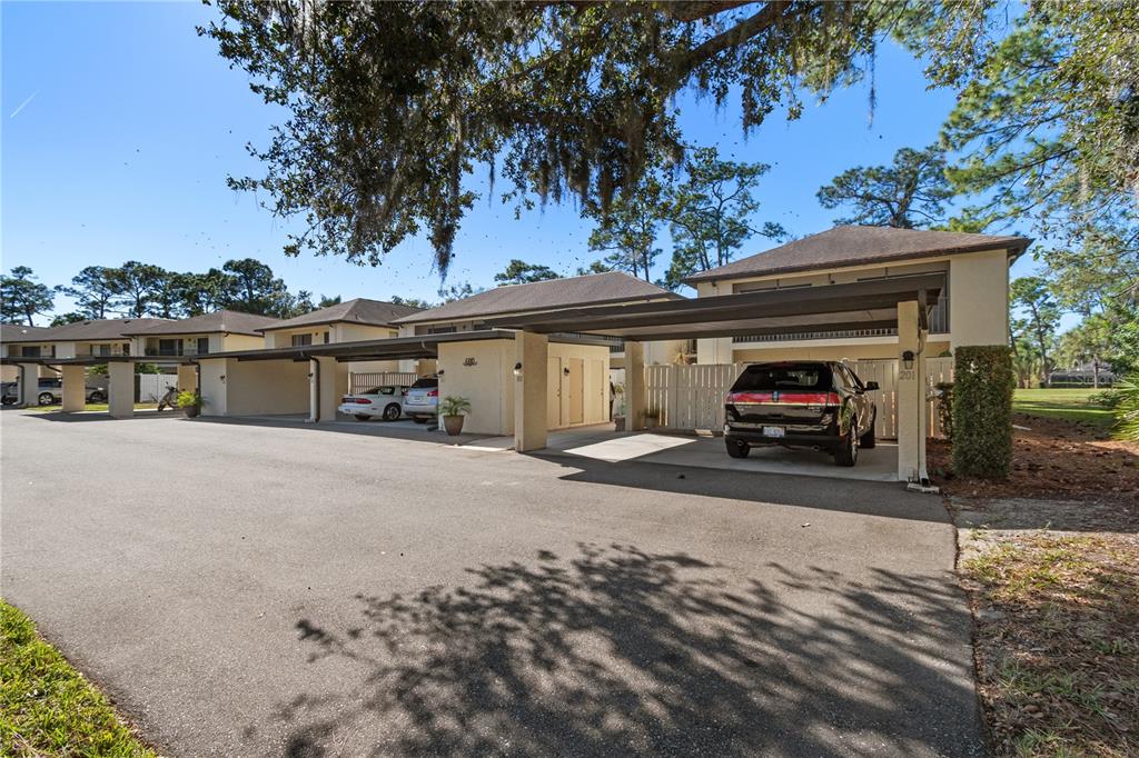 6110 Country Club Way, Unit 204 Sarasota, FL 34243 - Photo 3 of 66 a view of a car garage