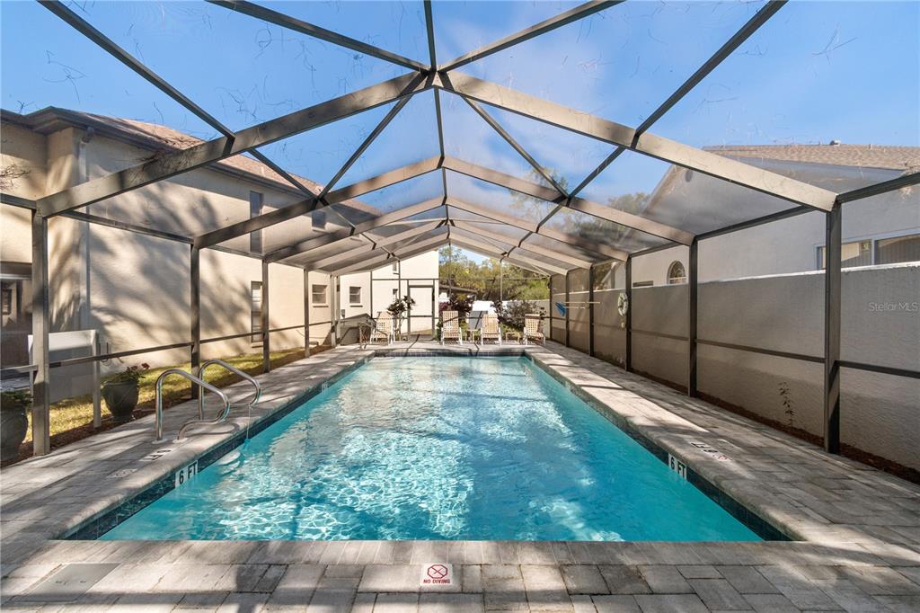 6110 Country Club Way, Unit 204 Sarasota, FL 34243 - Photo 42 of 66 a view of a backyard of a house