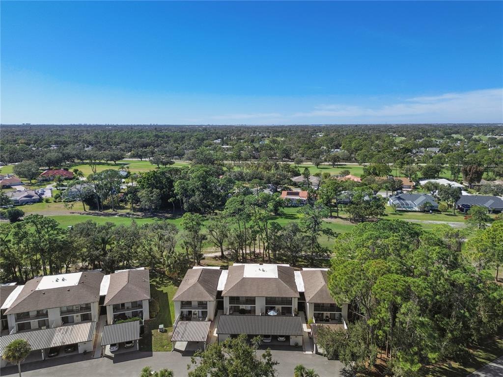 6110 Country Club Way, Unit 204 Sarasota, FL 34243 - Photo 48 of 66 an aerial view of multiple house