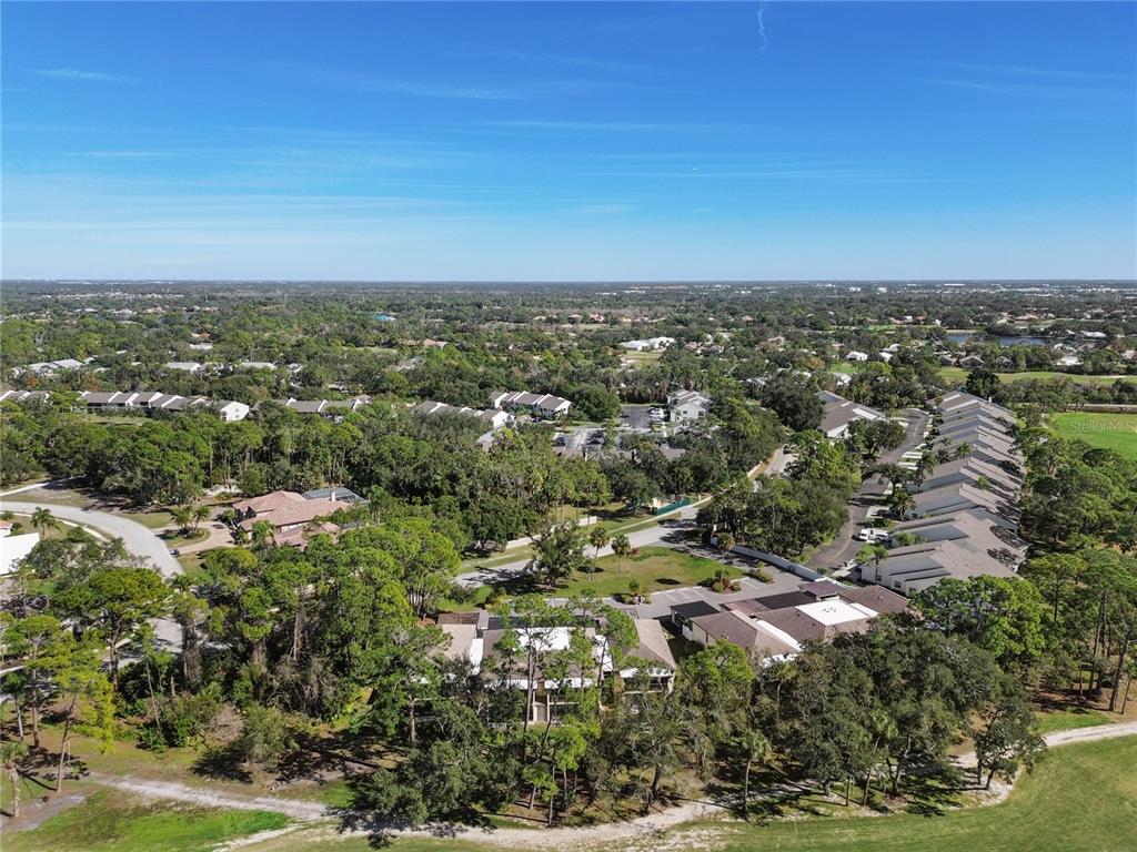6110 Country Club Way, Unit 204 Sarasota, FL 34243 - Photo 58 of 66 an aerial view of multiple house