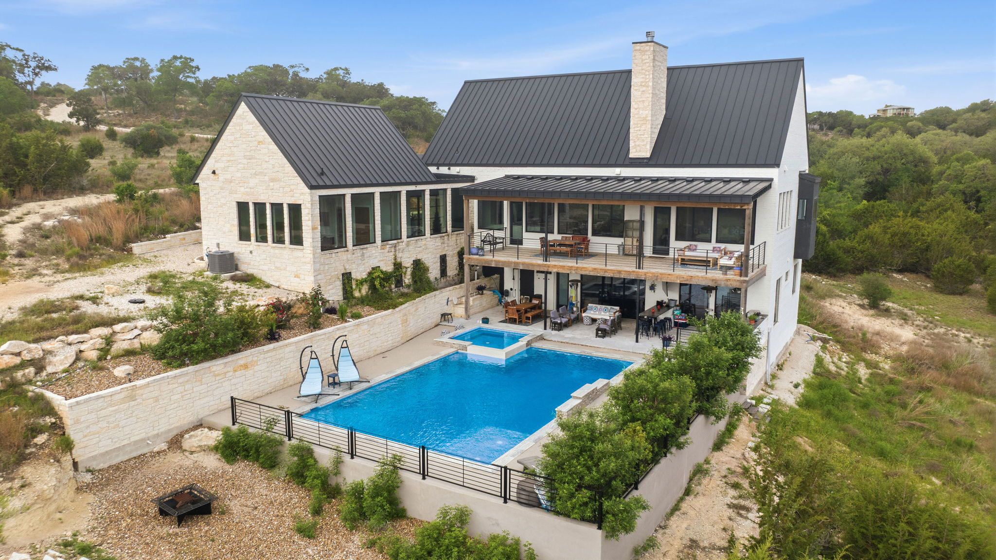 194 Placid Way Spring Branch, TX 78070 - Photo 34 of 37 a view of a house with pool and chairs