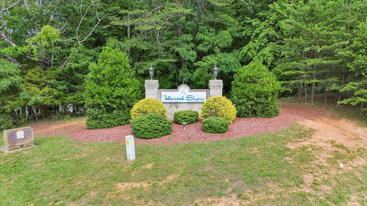 Lot 4-5 Idlewood Road Hardy, VA 24101 - Photo 55 of 65 a view of a garden with lawn chairs under an umbrella
