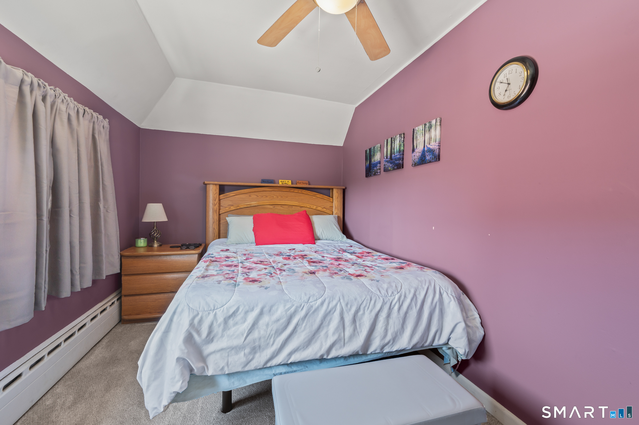 3 Flower Street Middletown, CT 06457 - Photo 9 of 17 a bedroom with a bed and a chandelier