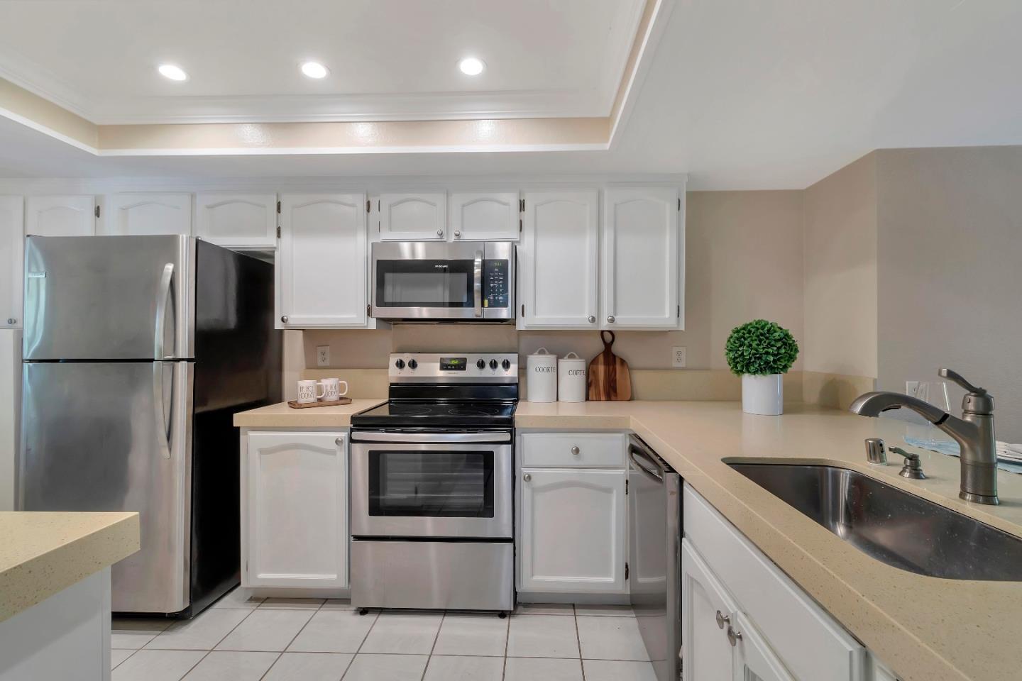 20682 Celeste Circle Cupertino, CA 95014 - Photo 13 of 31 a kitchen with a sink appliances and cabinets